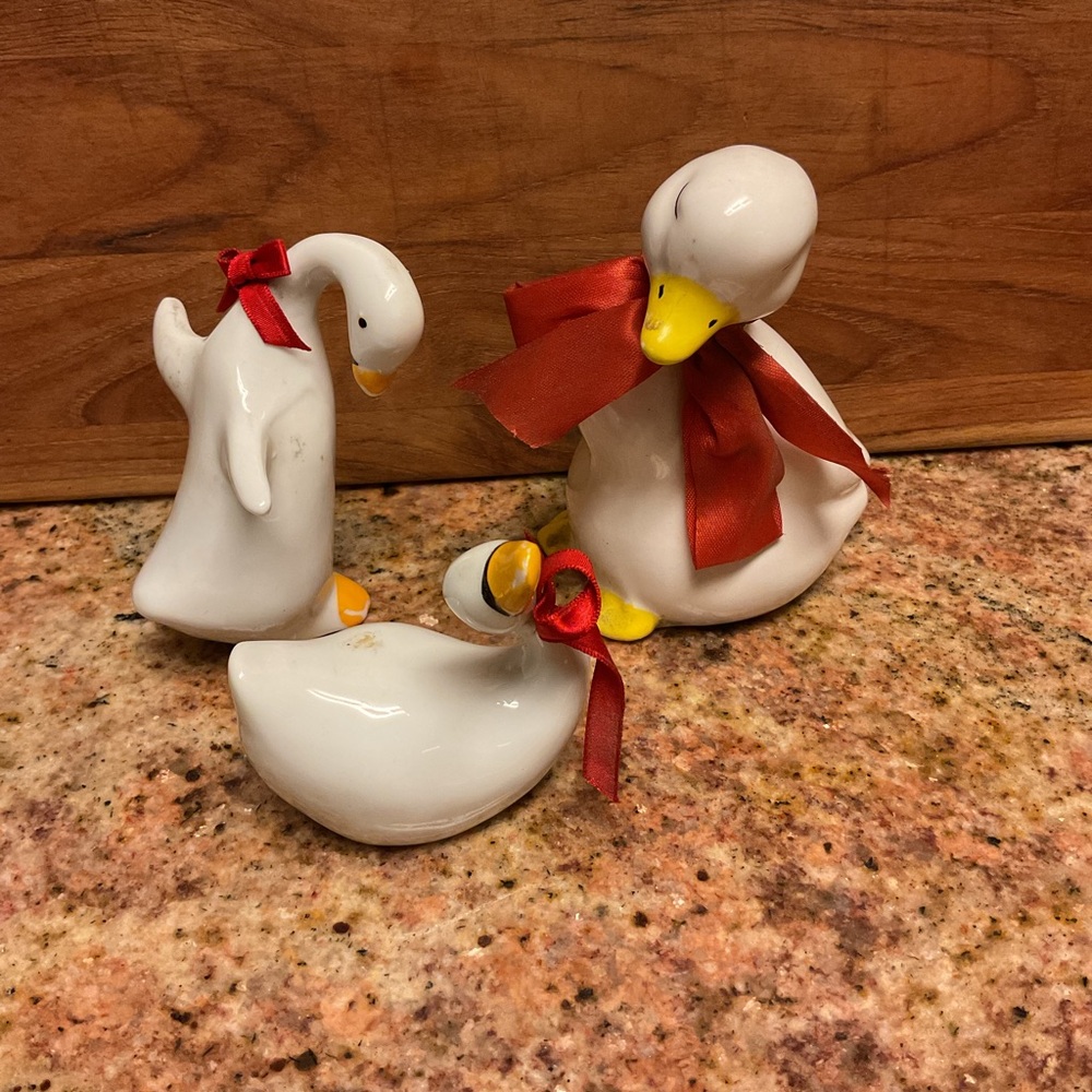 Duck Figurines with Red Accents. So cute and fun will be Darling Displayed